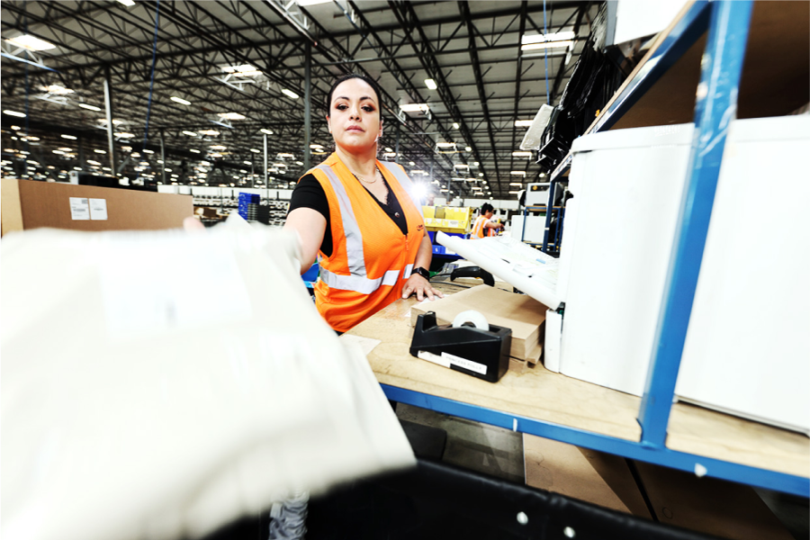 fulfillment center employee working on omnichannel fulfillment orders